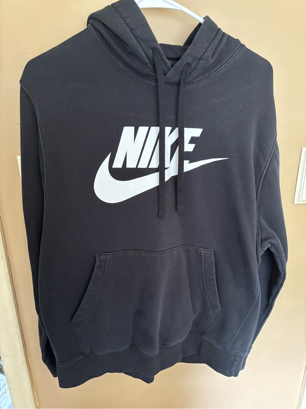 Nike Black Hoodie with White Swoosh Logo
